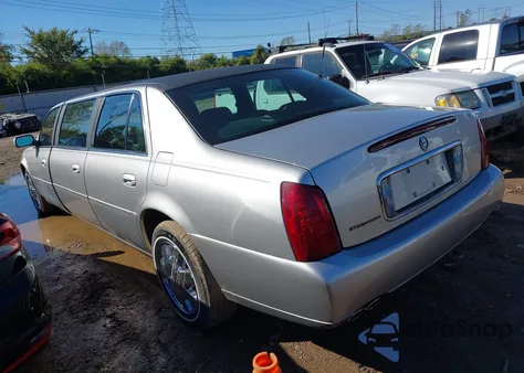 2001 Cadillac Deville Standard z USA, uszkodzony, nr VIN 1GEEH90Y51U550269